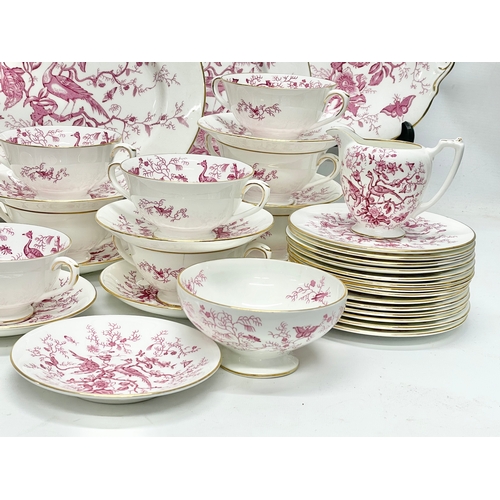 58 - A 103 piece Coalport pink and white ‘Cairo’ porcelain tea, coffee and dinner service. Circa 1926-195... 