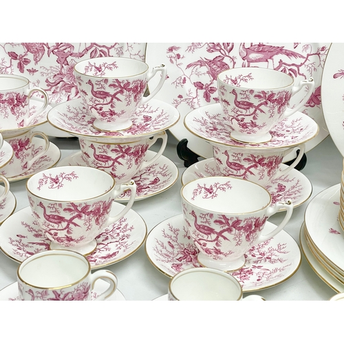 58 - A 103 piece Coalport pink and white ‘Cairo’ porcelain tea, coffee and dinner service. Circa 1926-195... 