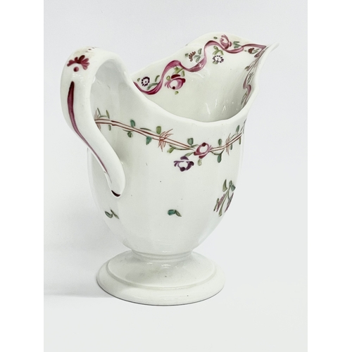 154 - A late 18th century New Hall ‘Pink Ribbons’ porcelain cream jug. Circa 1790. 13x6x10cm