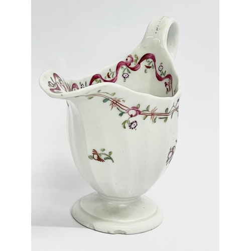 154 - A late 18th century New Hall ‘Pink Ribbons’ porcelain cream jug. Circa 1790. 13x6x10cm