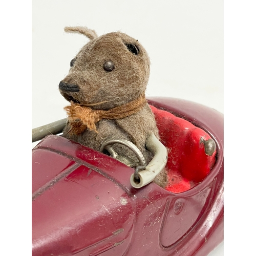 439 - A rare vintage Schuco Sonny 2005 windup mouse in car. Made in US Zone Germany. 14cm