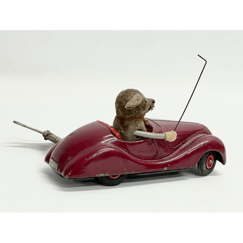 439 - A rare vintage Schuco Sonny 2005 windup mouse in car. Made in US Zone Germany. 14cm