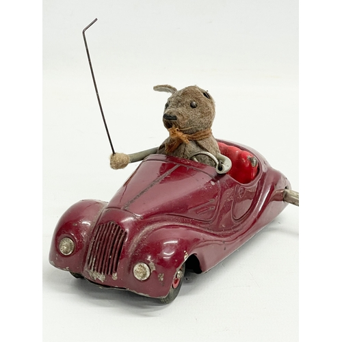 439 - A rare vintage Schuco Sonny 2005 windup mouse in car. Made in US Zone Germany. 14cm