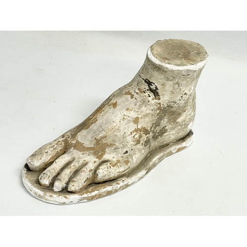 156 - A late 19th/early 20th century plaster foot. 25x13cm