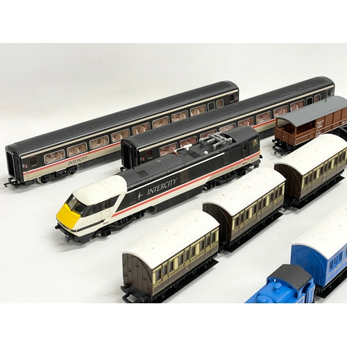 444 - A collection of Hornby trains and carriages. Caledonian Local. Intercity etc.