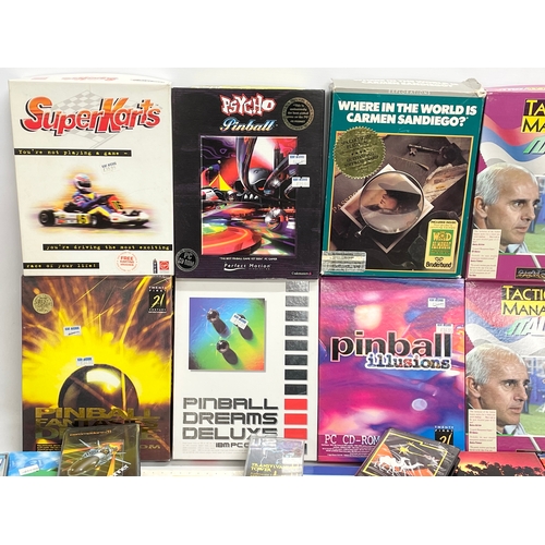 445 - A collection of vintage computer games with boxes and paperwork.