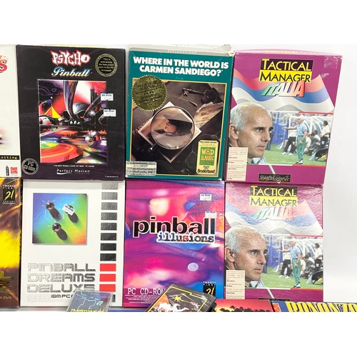 445 - A collection of vintage computer games with boxes and paperwork.