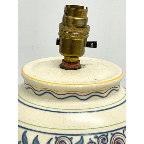 281 - A large vintage Charlotte Rhead pottery table lamp. 695. 17x32cm