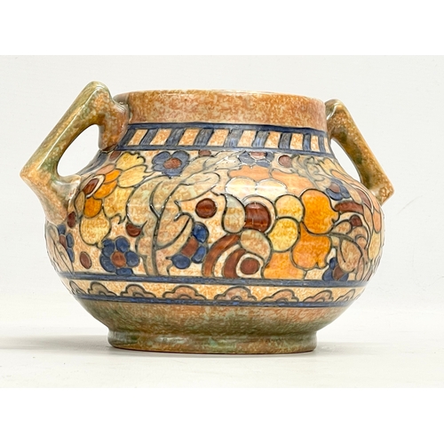 282 - A 1930’s Charlotte Rhead ‘Byzantine’ 2 handled pot. 23x20x15cm