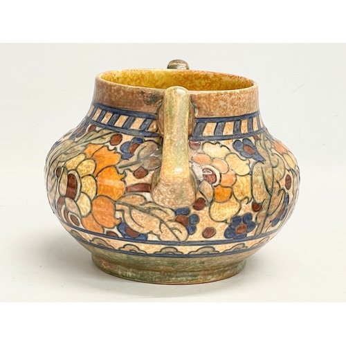 282 - A 1930’s Charlotte Rhead ‘Byzantine’ 2 handled pot. 23x20x15cm