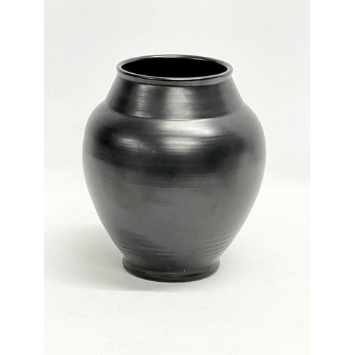 233 - A 1930’s Pilkington's Royal Lancastrian black glazed vase. 20x23cm