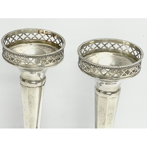 480 - A pair of silver trumpet vases. MN&WB. Birmingham. 1936. 220.62 grams filled. 16.5cm