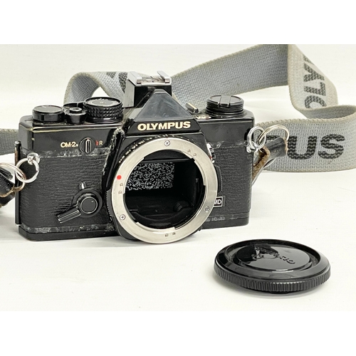 446 - A vintage Olympus OM-2n camera.