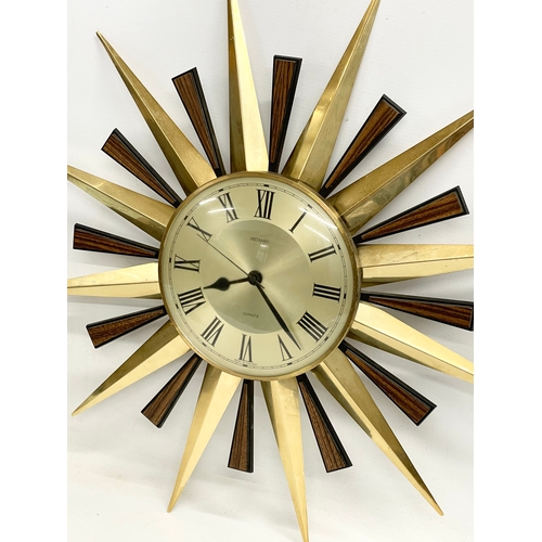 125 - A 1960’s Mid Century ‘Sunburst’ wall clock. By Metamec. 60cm