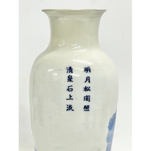 142 - A 19th century Chinese blue and white landscape vase. 30.5cm