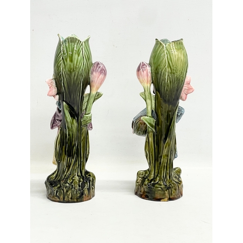 157 - A pair of late 19th century French Barbotine Majolica figures. 6614. 30cm