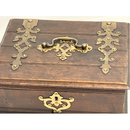 159 - A Victorian pine brass bound jewellery box. 26x21x10.5cm