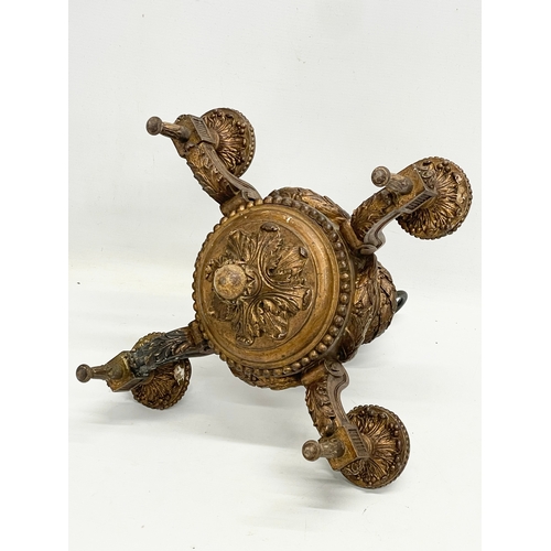 161 - An early 20th century gilt ceiling candleholder. 32x32x38cm