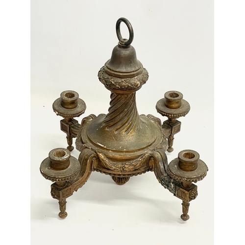 161 - An early 20th century gilt ceiling candleholder. 32x32x38cm