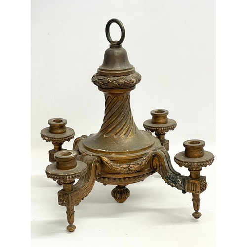 161 - An early 20th century gilt ceiling candleholder. 32x32x38cm