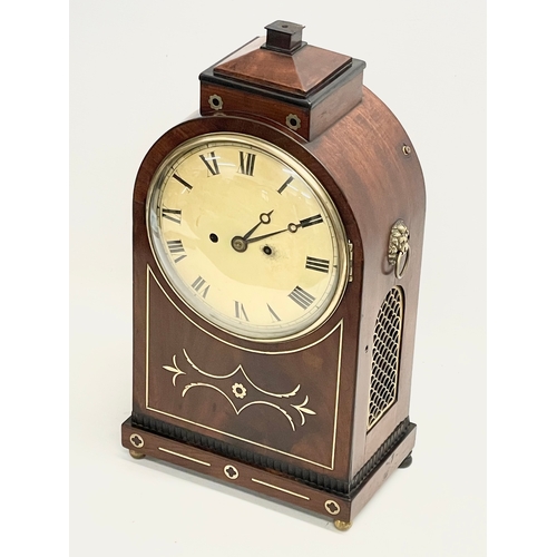 26 - A large Regency mahogany brass inlaid double fusee mantle clock with pendulum. 27x16x50cm