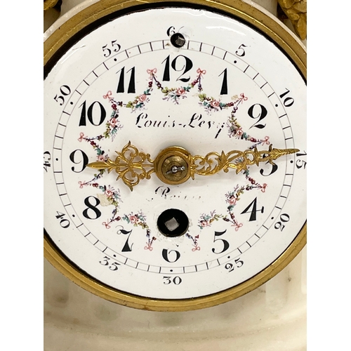 236 - A late 19th century French marble mantle clock with brass mounts and enamel face. 11x11x23.5cm