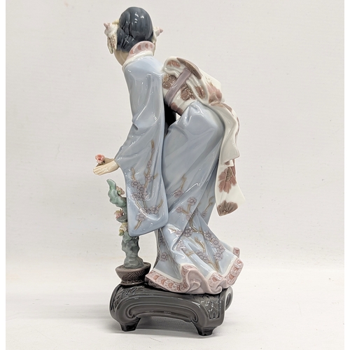 506 - A Lladro porcelain 'Mayumi' figurine. 1449G. 24cm