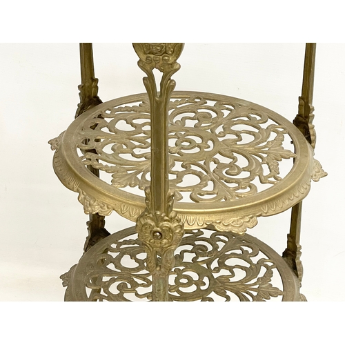 267 - A vintage brass 3 tier plantstand. 65cm