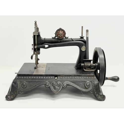 266 - A late 19th century sewing machine. 42x22x28cm