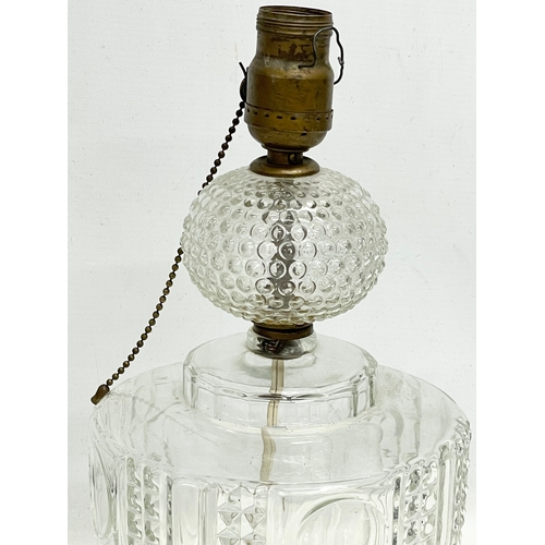 293 - An early 20th century clear glass table lamp by Idealite INC. 36cm