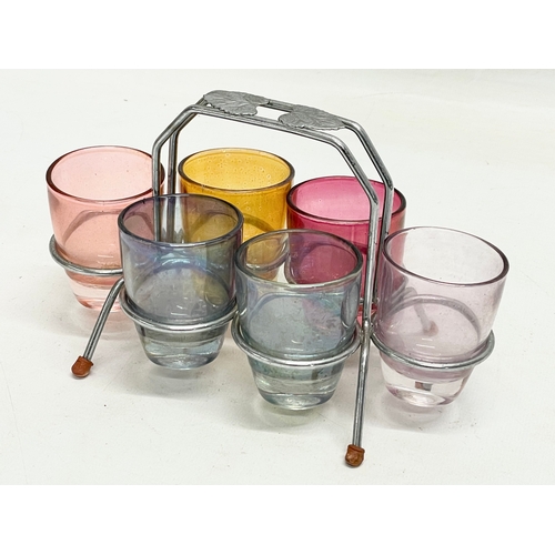 244 - 2 sets of 1960’s multicoloured shot glasses on stands.