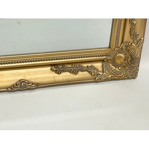 207 - A large gilt framed mirror. 77x107cm