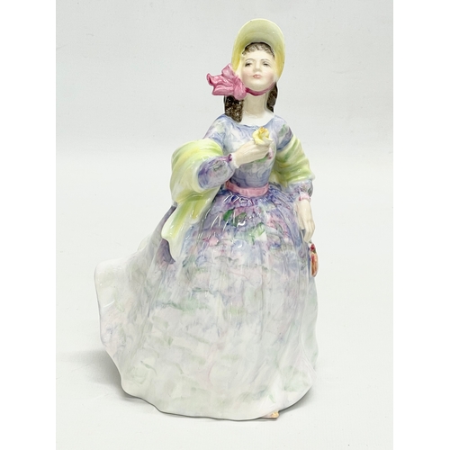 263 - 3 Royal Doulton figurines. A Royal Doulton ‘Balloon Girl’ 17cm. A Royal Doulton ‘Clare’ HN2793 20cm.... 