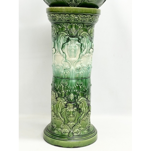 170 - A large late 19th century Majolica jardiniere on stand. Stamped Lily. 42x90cm