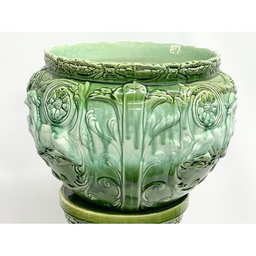 170 - A large late 19th century Majolica jardiniere on stand. Stamped Lily. 42x90cm