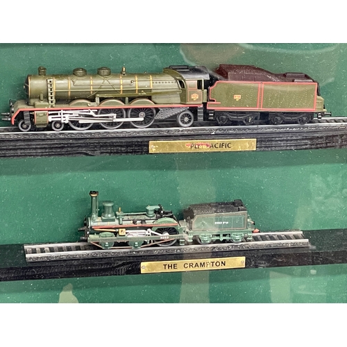 454 - Large framed model trains. 85x60cm