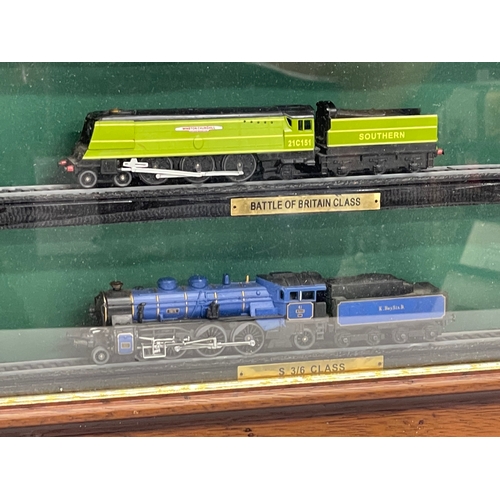 454 - Large framed model trains. 85x60cm