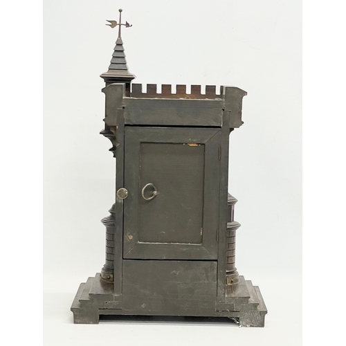 31 - A large 19th century Black Forest Junghans ‘Castle’ mantle clock. With pendulum. 33x19x53cm