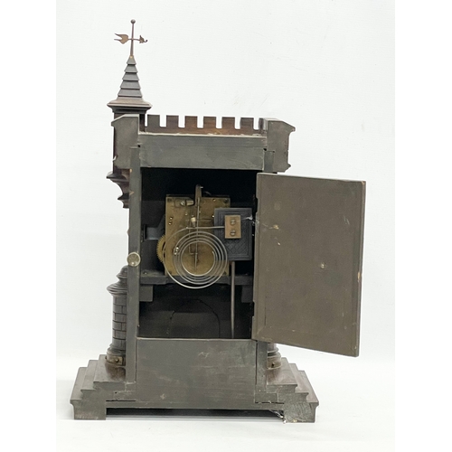 31 - A large 19th century Black Forest Junghans ‘Castle’ mantle clock. With pendulum. 33x19x53cm