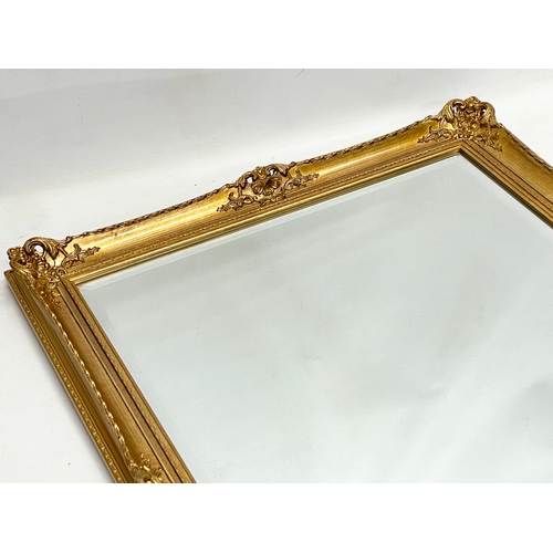 150I - A good quality ornate gilt framed bevelled mirror. 60x81cm