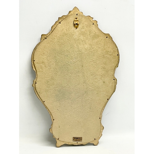 206C - A vintage ornate gilt framed mirror by Atsonea. 34x53cm.