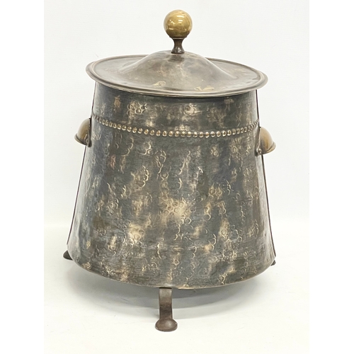 150T - An early 20th century Art Nouveau brass coal bin with lid. 35x36x44cm.