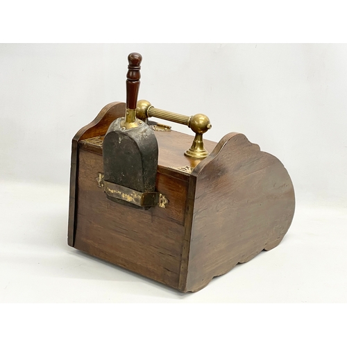 127A - An Edwardian brass bound coal scuttle. 31x45x34cm