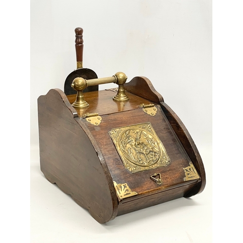 127A - An Edwardian brass bound coal scuttle. 31x45x34cm