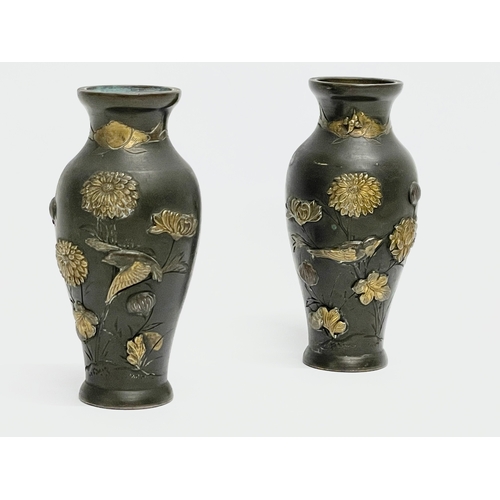 261H - A pair of late 19th century small Japanese bronze vases with brass birds and flower motif. 9cm