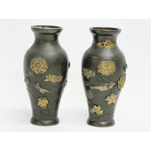 261H - A pair of late 19th century small Japanese bronze vases with brass birds and flower motif. 9cm