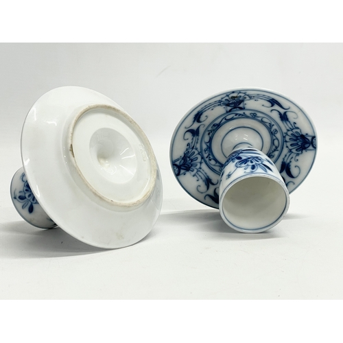 127F - A pair of late 19th century Fischer & Mieg, Pirkenhammer porcelain candleholders/egg cups. 10x8cm