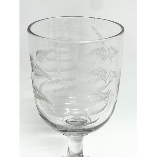 219H - A Victorian etched glass rummer. 8x15cm