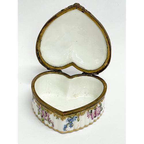 219J - A 19th century Meissen porcelain trinket box with hand painted flower and gilding decoration. 8x8x3.... 