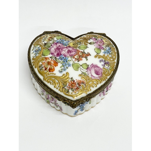 219J - A 19th century Meissen porcelain trinket box with hand painted flower and gilding decoration. 8x8x3.... 